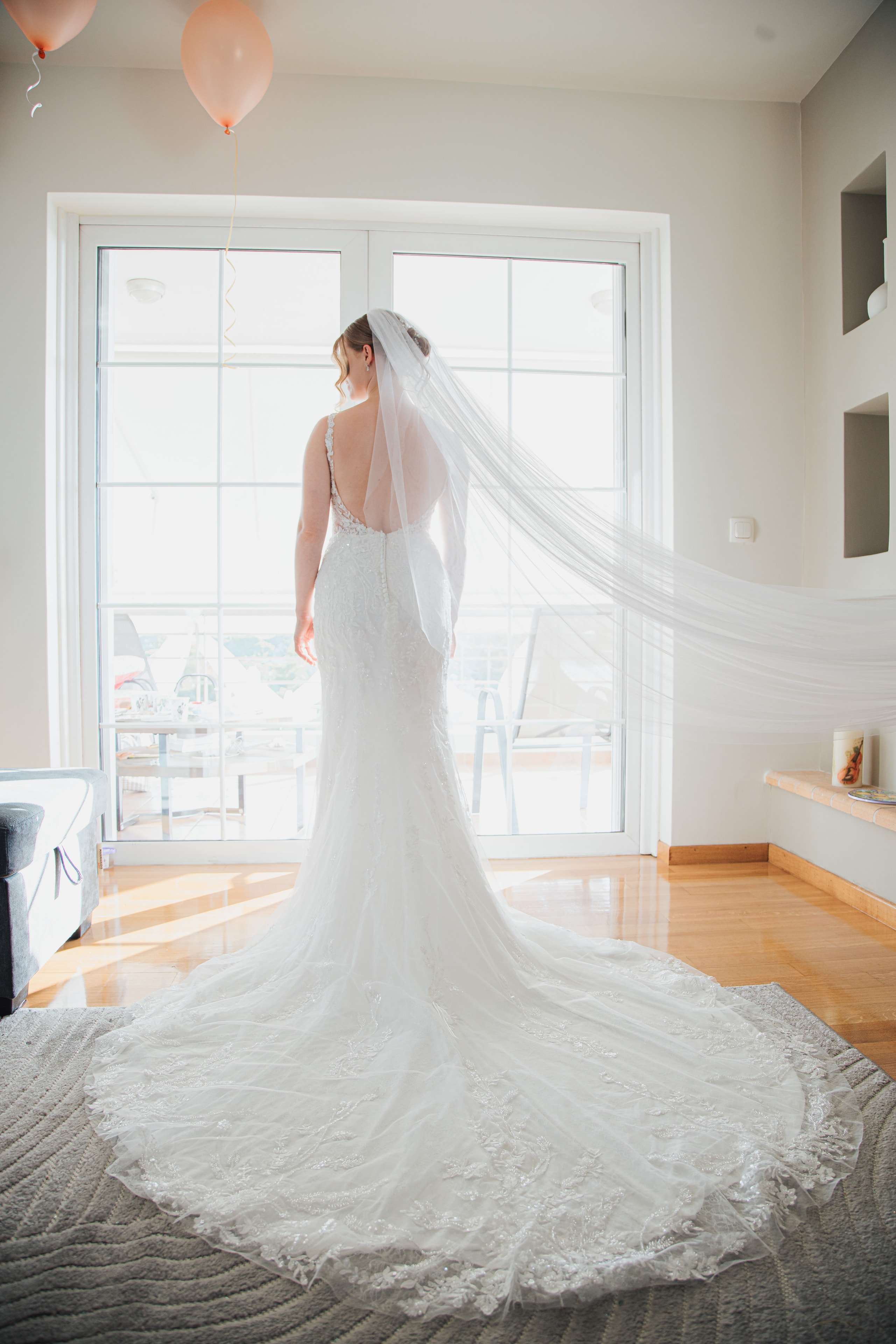 Ioanna in her wedding dress with a flowing veil