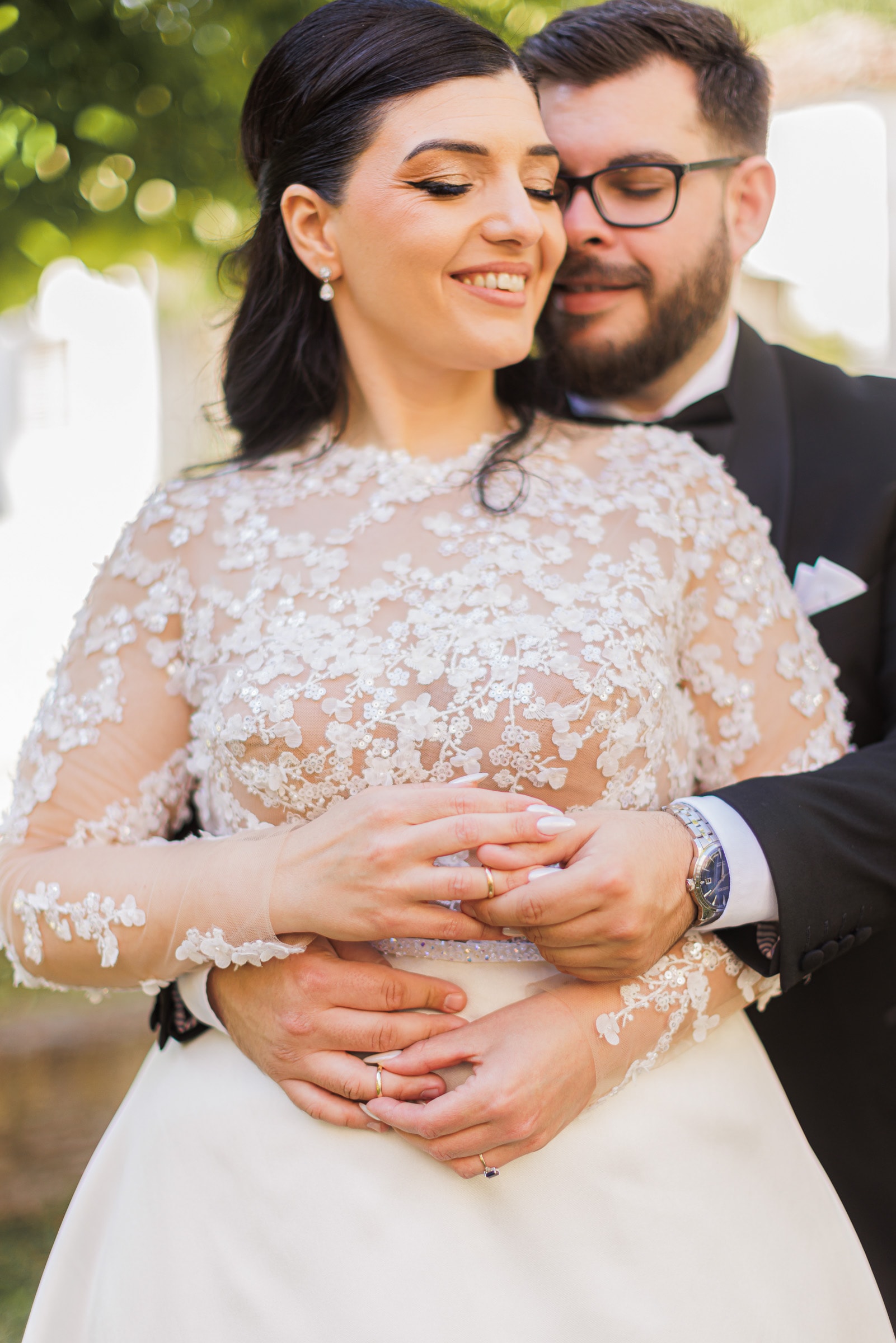 Ioanna and Christos sharing a close wedding portrait