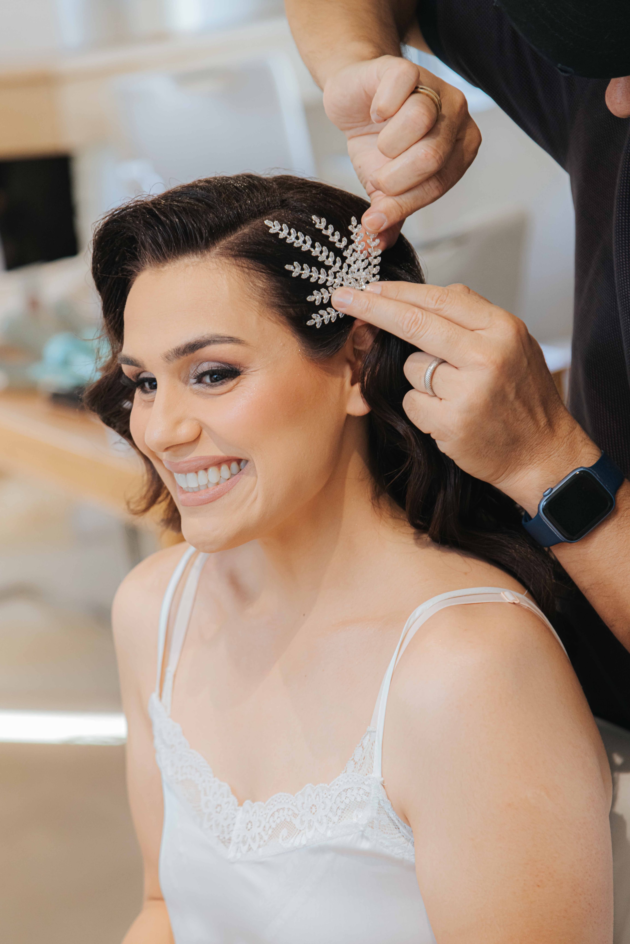 Varvara having her jeweled hair accessory placed