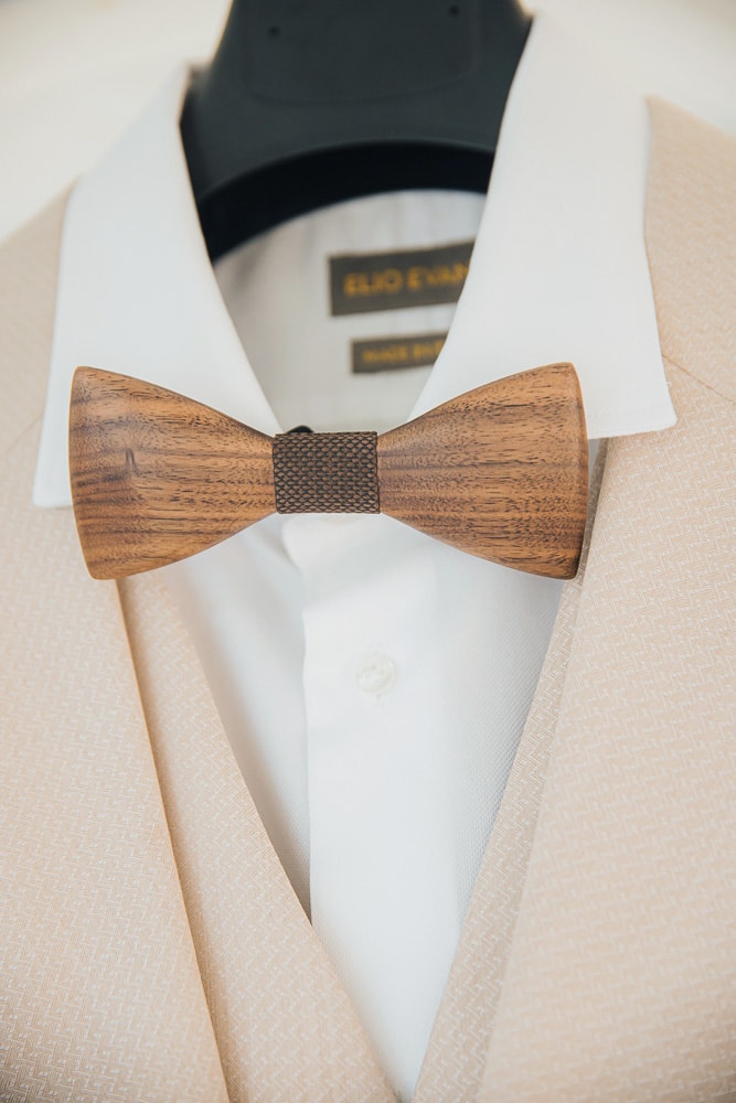 Wooden bow tie wedding detail